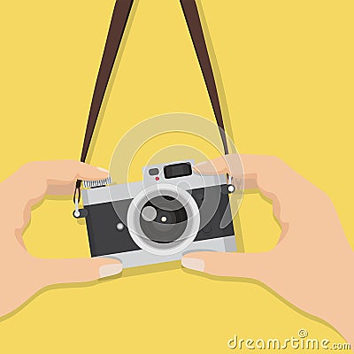 Vintage camera with hand holding Vector Illustration