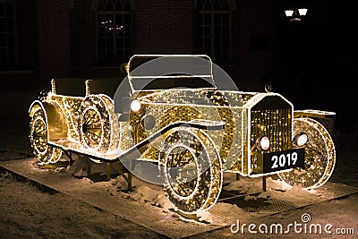 Vintage car of glowing Christmas lights Editorial Stock Photo