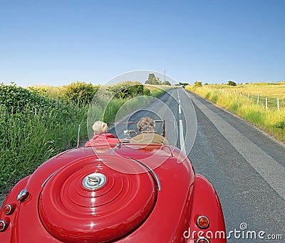 Vintage car open road touring Editorial Stock Photo