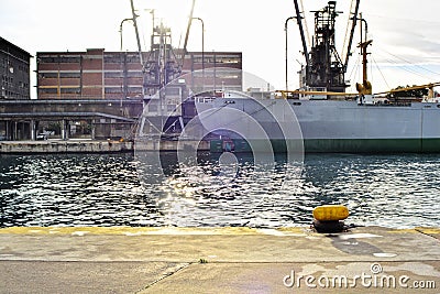 Vintage cargo vessel at dock Stock Photo