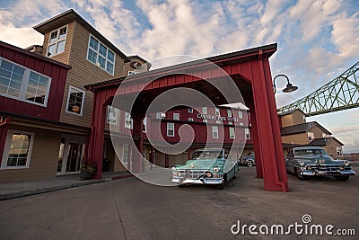Vintage cars parked outside the luxury Cannery Pier Hotel next to the Astoria-Megler bridge Editorial Stock Photo