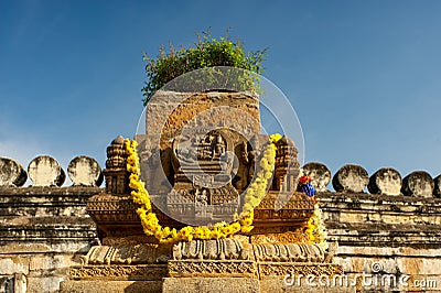 Vintage Carved idol on the outer wall of a small temple Ranganathaswamy Temple Editorial Stock Photo