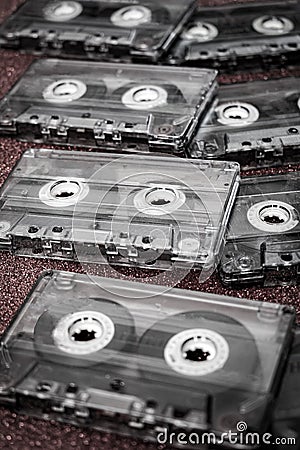 Vintage Cassette Tapes Close-Up on Bold Red Background Stock Photo