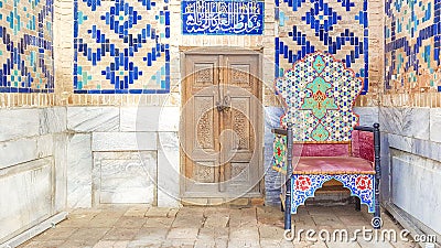 Vintage chair with a Muslim ornament at the entrance to the ancient mosque Stock Photo