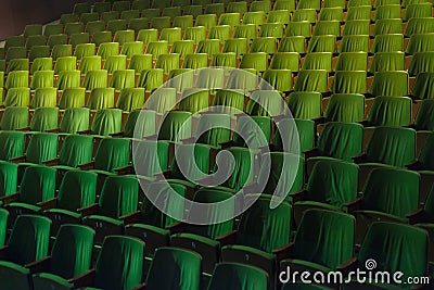 Vintage cinema theater movies audience retro seating seats, 50s 60s green, nobody Stock Photo