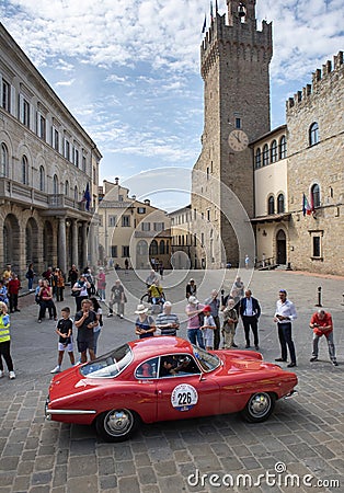 Vintage classic sports car engaged in a regularity competition in Arezzo Editorial Stock Photo