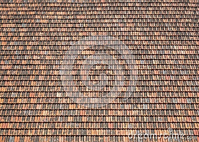 Old red clay tiles on vintage roof Stock Photo