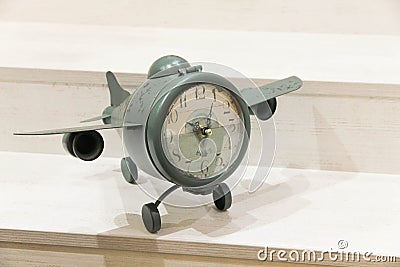 Vintage clock-aircraft. Concept: time flies Stock Photo