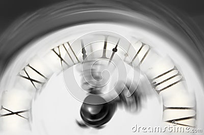 Vintage clock blurred - conceptual image of time running or passing away Stock Photo