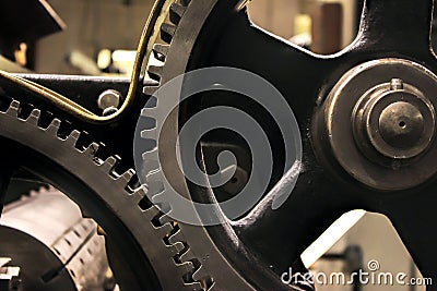 Vintage cogs gears wheels collection set. Mechanism parts macro view. Different cogwheels teeth shapes objects with textured metal Stock Photo