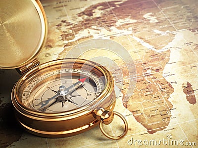 Vintage compass on the old world map. Travel concept. Stock Photo