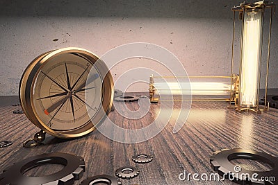 Vintage compass on a wooden table with lamps Stock Photo