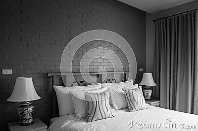 Vintage cozy country home bedroom decoration with classic dark grey brick wall Editorial Stock Photo