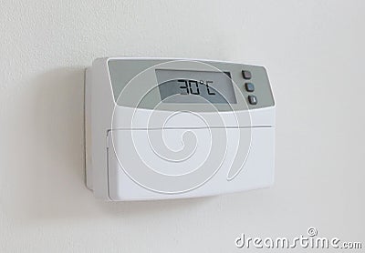 Vintage digital thermostat - Covert in dust - 30 degrees celcius Stock Photo