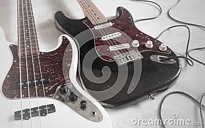 Vintage dirty worn electric guitar and bass Stock Photo