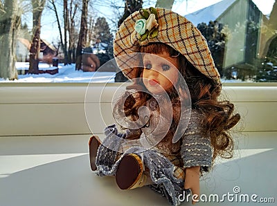 Vintage doll with curly hair Stock Photo