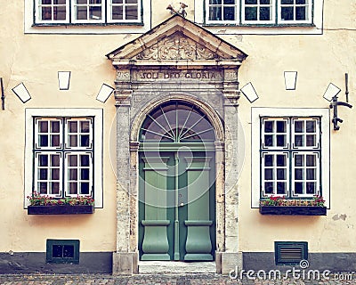Vintage door on a medieval building facade in Riga, La Stock Photo