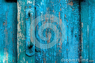 Vintage door pull handle on weathered scratched wooden surface. Concept of security and privacy protection. Textured grunge Stock Photo