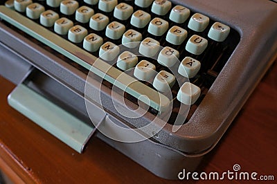 Vintage dusty typewriter with English and east-european letters Stock Photo