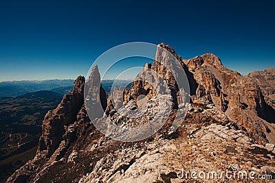 Vintage effect of dolomite rocky panorama with innumerable spiers in the Latemar Stock Photo