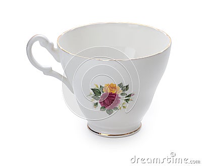 Vintage English porcelain tea cup with nice roses pattern isolated on white background Stock Photo