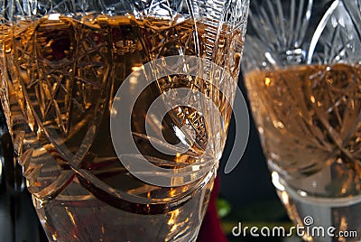Vintage faceted crystal glass with white wine closeup Stock Photo
