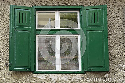 Vintage faÃ§ades with green shutter in Sibiu Romania Stock Photo