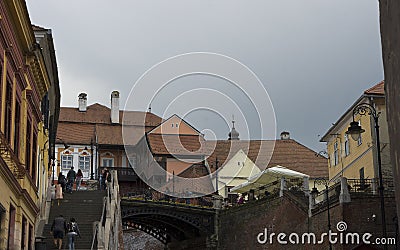 Vintage facades with stone road in Sibiu Romania Editorial Stock Photo