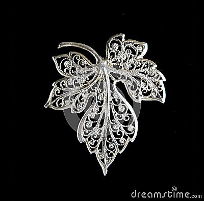 Vintage filigree silver brooch Grape leaf Stock Photo