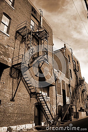 Vintage fire escape on brick building Stock Photo