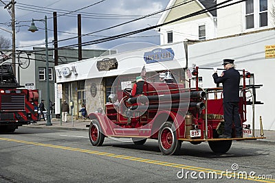 A vintage fire truck during a Saint Patrick's Day Parade, Long Island, New your, USA Editorial Stock Photo