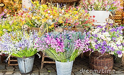 Vintage flowers market on public street - retro cottagecore style Stock Photo