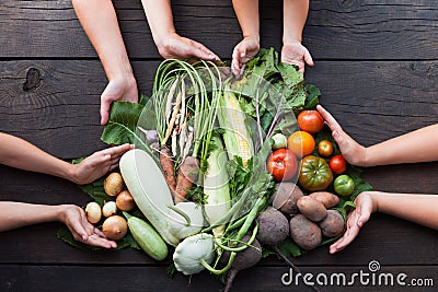 Vintage fresh vegetables and herbs on wooden background Stock Photo
