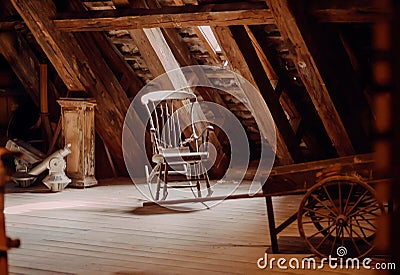 Vintage furniture in abandoned house. Old rocking chair in rustic vintage style attic Stock Photo