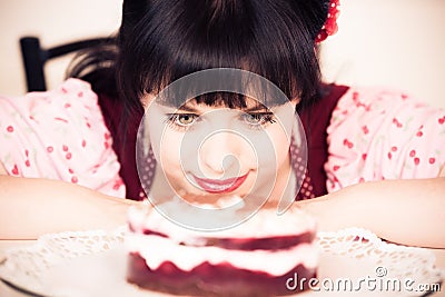 Vintage Girl Baking A Cake Stock Photo