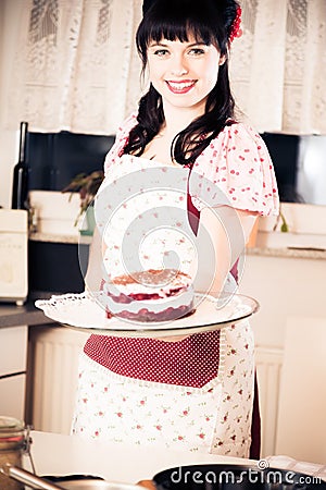 Vintage Girl Baking A Cake Stock Photo