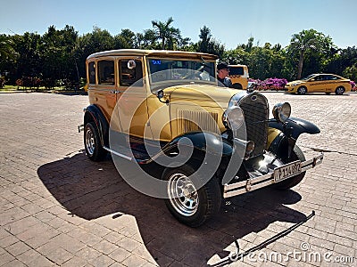 Vintage golden car near the beach Editorial Stock Photo