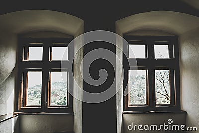 Symmetrical arch windows of an ancient gothic building Stock Photo