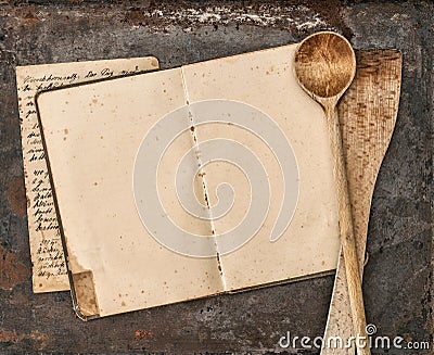 Vintage handwritten recipe book and old kitchen utensils Stock Photo