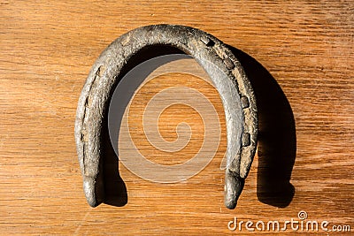 Vintage horseshoe with metal nails Stock Photo