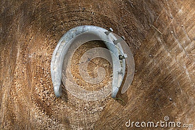 Vintage horse shoe with metal nails, talisman, good luck charm Stock Photo