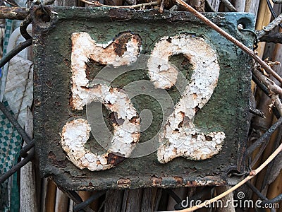 Vintage house number 52 Stock Photo