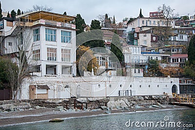 Vintage houses on a hill by the sea Stock Photo