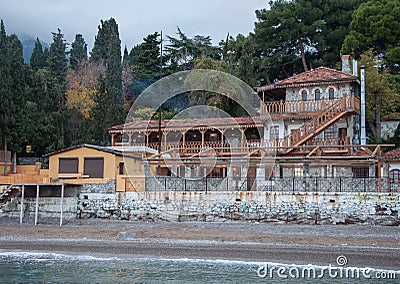 Vintage houses on a hill by the sea Stock Photo