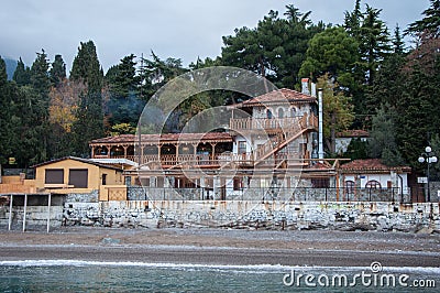 Vintage houses on a hill by the sea Stock Photo