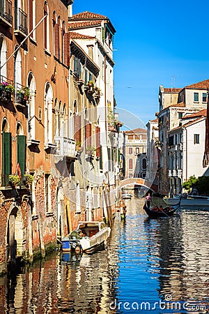 Vintage houses, Venice, Italy. View of facades of residential buildings on old street in Venice center Editorial Stock Photo