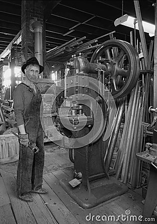 Vintage Industrial Factory Worker, Manufacturing Shop Floor Stock Photo