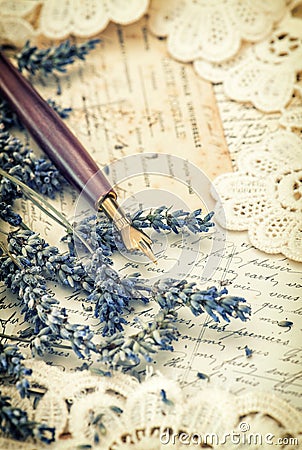 Vintage ink pen, dried lavender flowers and old love letters Stock Photo