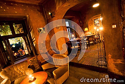 Vintage interior restaurant with lamps, chairs, old style without visitors Editorial Stock Photo