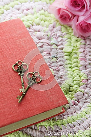 Vintage keys and book Stock Photo